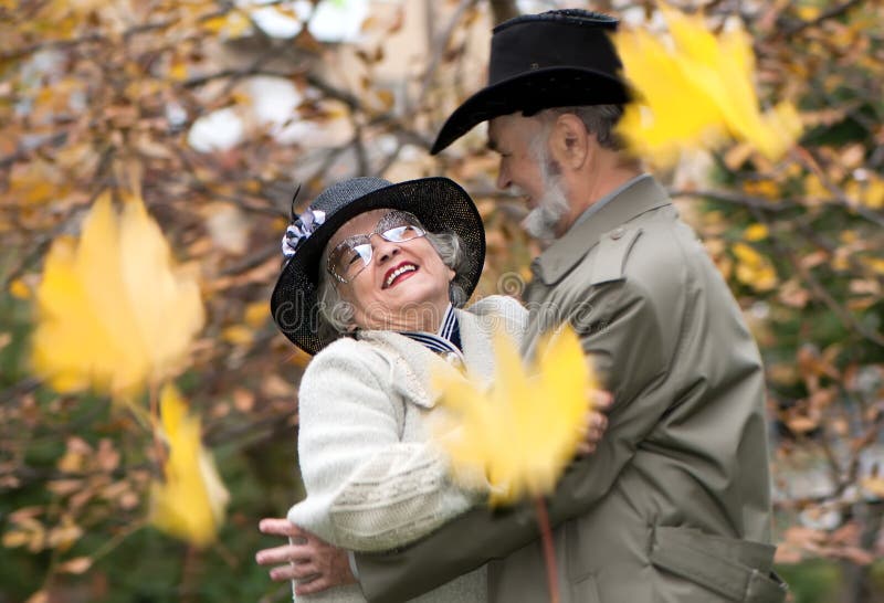 Old coule in autumnal park