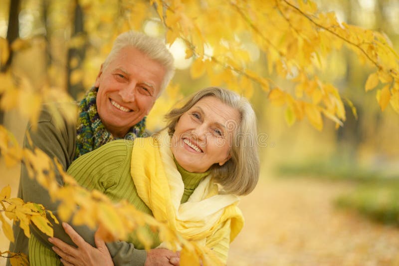 Old couple at autumn park