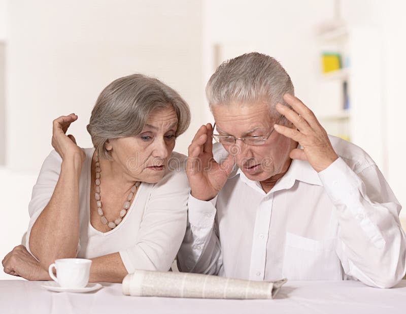 Old couple at breakfast