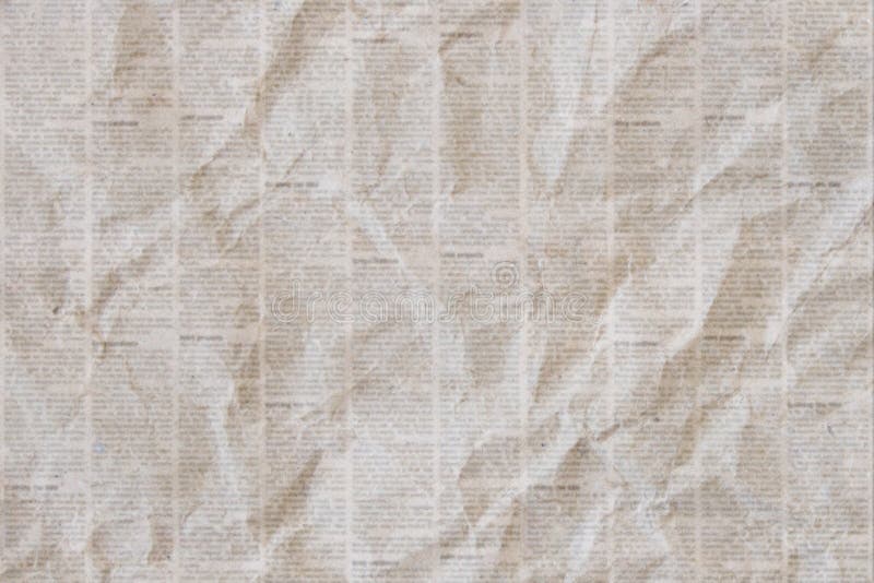 Old crumpled grunge newspaper paper texture background. Blurred vintage newspaper background. Crumpled paper textured page. Gray brown beige collage news paper background. Old crumpled grunge newspaper paper texture background. Blurred vintage newspaper background. Crumpled paper textured page. Gray brown beige collage news paper background.