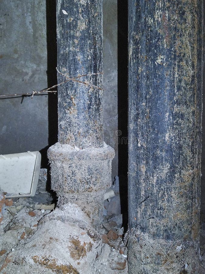 Old damaged water pipes stock photo.