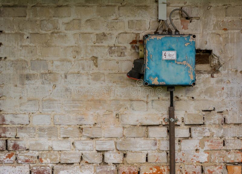 Old bad rusty switch box on weathered wall royalty free stock photo Old bad rusty switch box on weathered wall royalty free stock photo