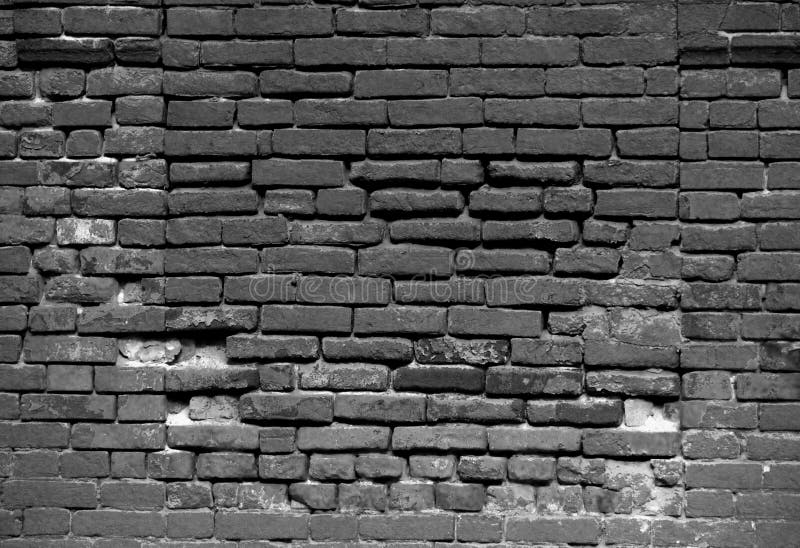 Old dark brick wall, texture background. Wintage gray wall stock photos Old dark brick wall, texture background. Wintage gray wall stock photos