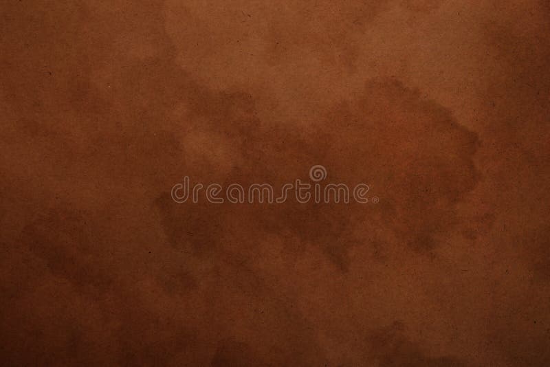 Old dark brown paper parchment background royalty free stock photos