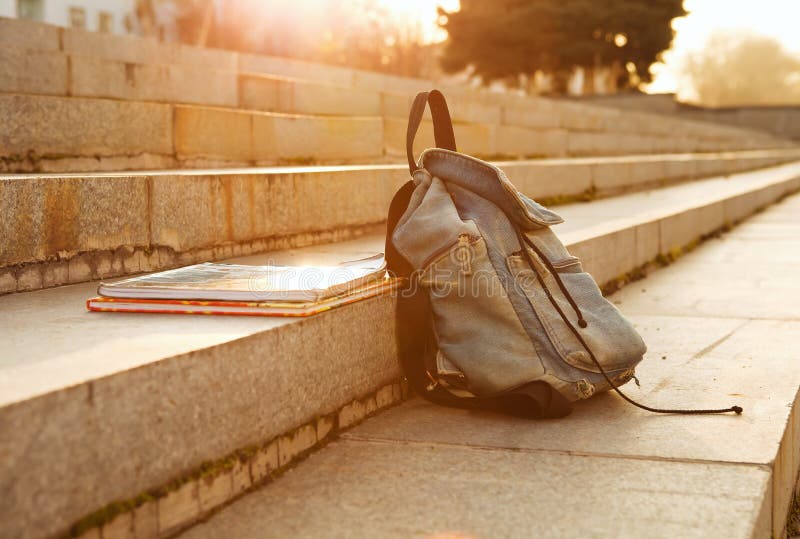 Old denim school backpack royalty free stock photography