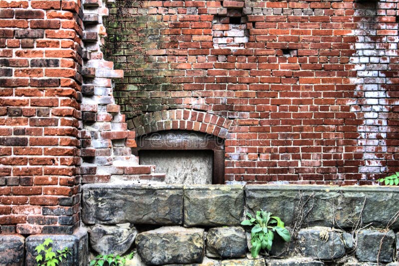 A Hidden Door Of A Delapitated Old Brick Building Stock Image - Image