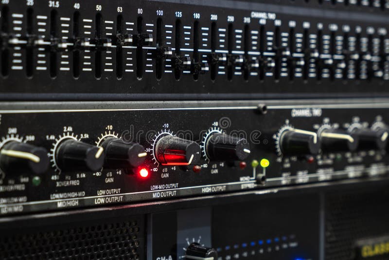 Old and Dirty Electronic Sound Mixer Equalizer in the Professional