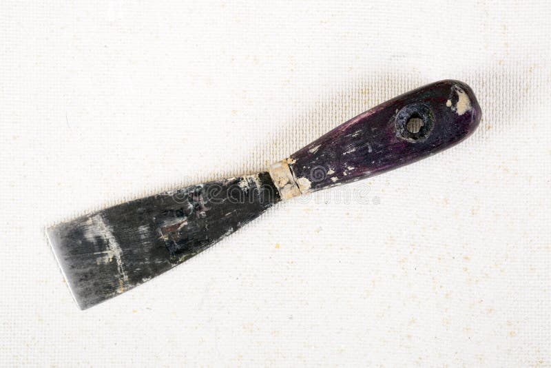 Old dirty and rusty putty kniffe stock photos