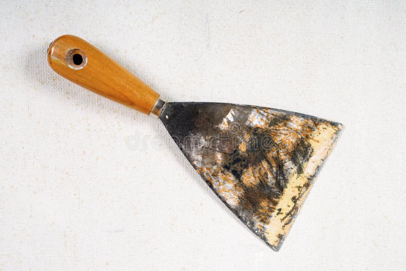 Old dirty and rusty putty kniffe royalty free stock images