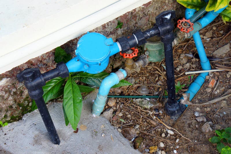 Old and Dirty Tab Water Pipe and Meter on Ground Stock Image Image of