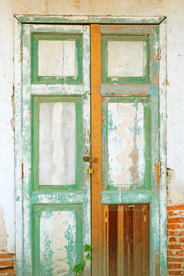 Old door with brick wall