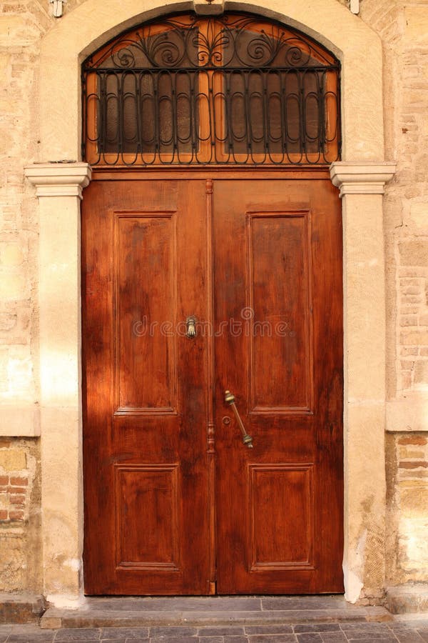 Old door with knocker stock image. Image of heritage - 13160509