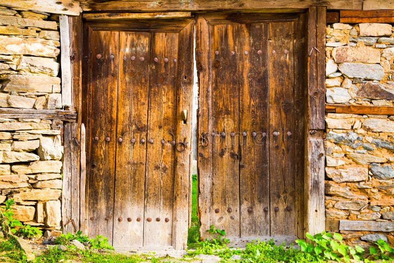 Old double rustic wooden barn doors