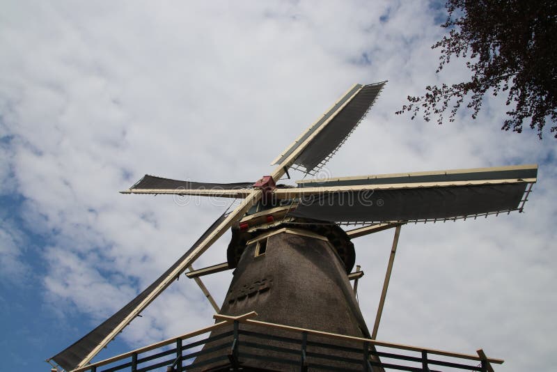 Old dutch windmill in villagye named Oldebroek with name De Hoop, still working as peel and as grind mill. Old dutch windmill in village named Oldebroek with stock photography Old dutch windmill in villagye named Oldebroek with name De Hoop, still working as peel and as grind mill. Old dutch windmill in village named Oldebroek with stock photography