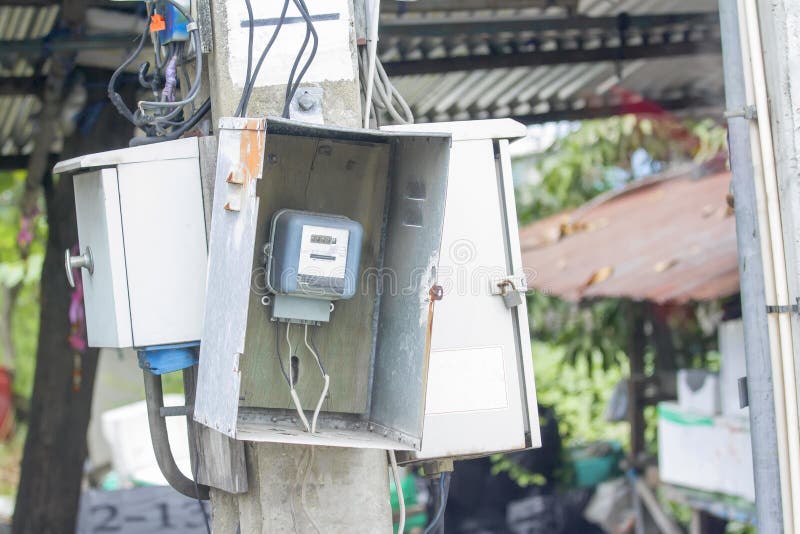 Old Electrical Meter Mounted at the Post. Stock Photo Image of home