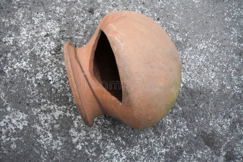 Old Empty Round Red Clay Bowl. Round Clay Cup. Top View of Clay Bowl on
