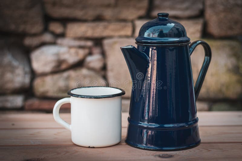 Old enamel coffee mug and pot