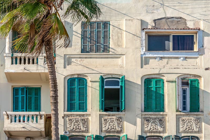 Old facade with wooden windows on windows in Alexandria stock image Old facade with wooden windows on windows in Alexandria stock image