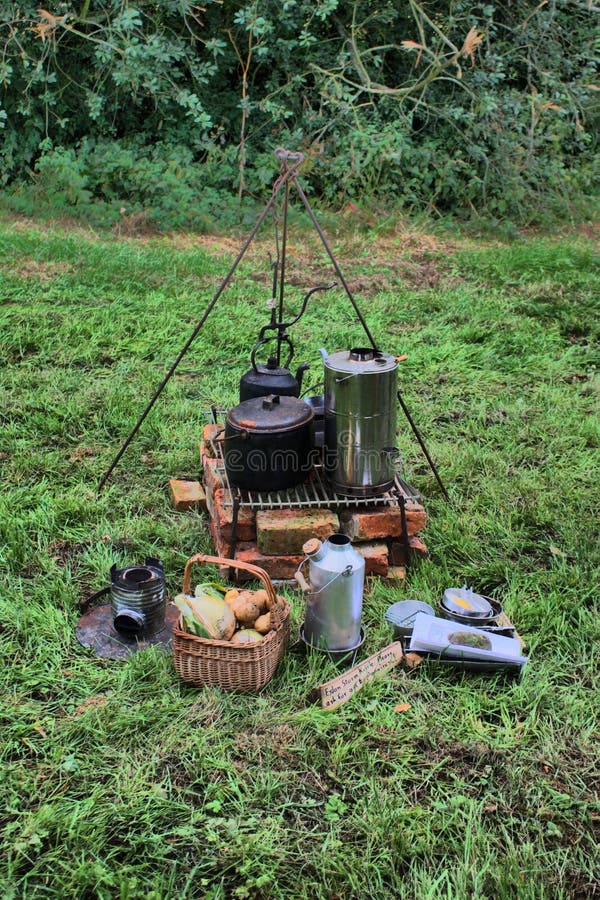 Cooking pots over fire stock image. Image of pots, stool 1407721
