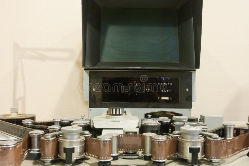 Old-fashioned film editing machine (a video recorder for television program production). Computer editing stock images, royalty-free photos and pictures