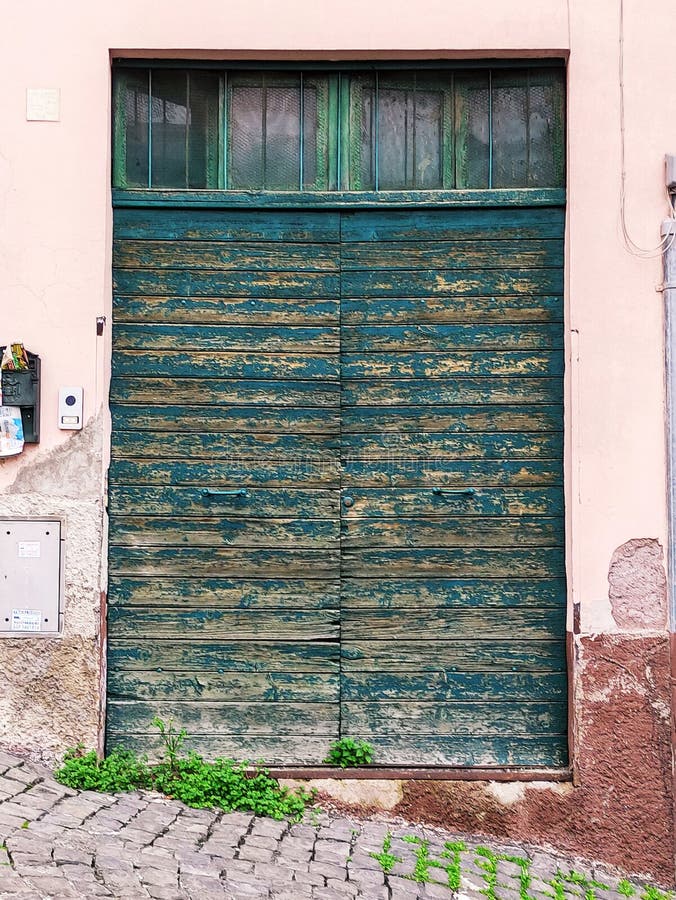 Old Fashioned Green Garage Door Stock Photo Image of wall, floor