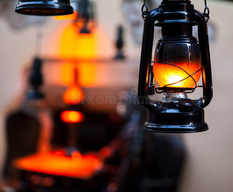 Old fashioned lantern in darkness. Light concept. royalty free stock photography