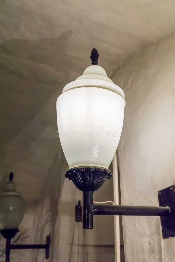Old Fashioned Light on the Wall of Basement Stock Photo Image of