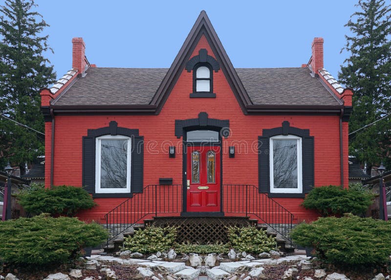 Old fashioned small red brick house