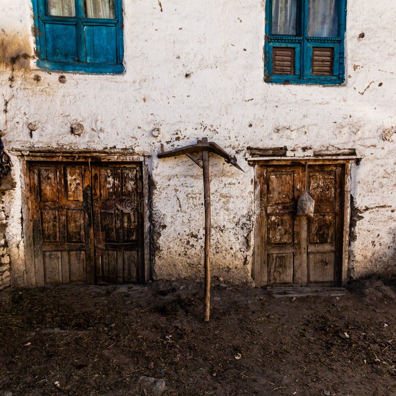 Old fashioned traditional dirty wood windows and doors in small mountain village in Nepal stock photography Old fashioned traditional dirty wood windows and doors in small mountain village in Nepal stock photography