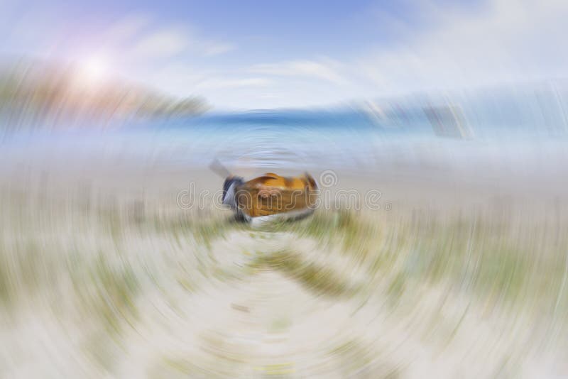 Old-fashioned Wooden Clinker Dinghy Pulled On Beach Stock 