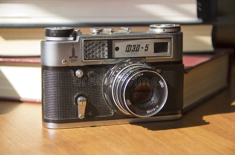 Old film camera on the table royalty free stock image Old film camera on the table royalty free stock image