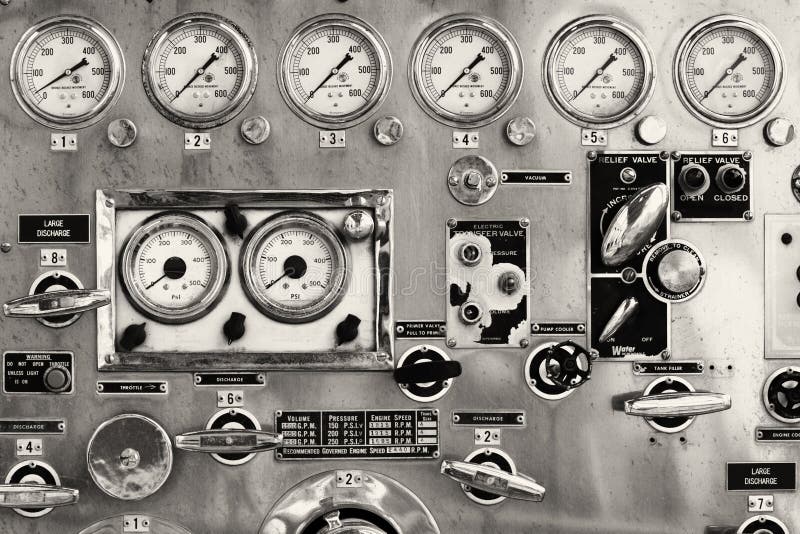 Closeup of an old instrument panel of a fire truck pump