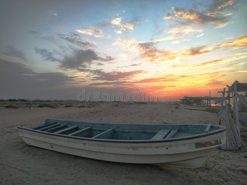 Old fishermen boat at beach in Alhail, Muscat, Oman