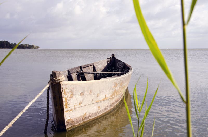 Old Fishing Boat Floating On Sea Water Stock Photo - Image ...