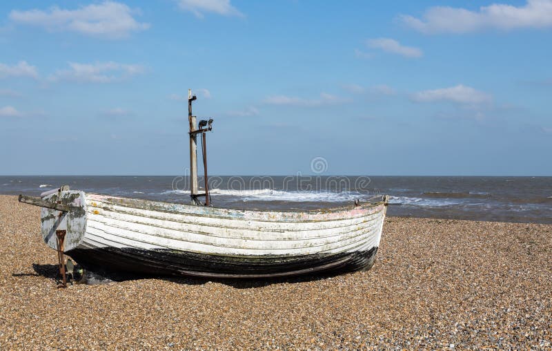 Old Fishing Boat On Pebble Beach Stock Image - Image of 