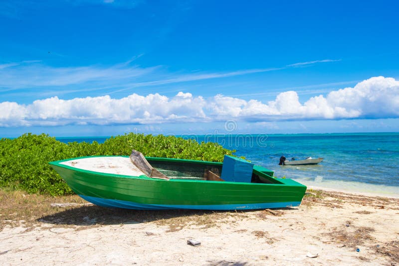 Old Fishing Boat On A Tropical Beach At The Stock Photo ...