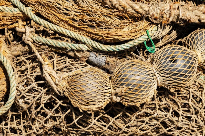 Old Fishing Nets with Ropes and Floats Full Frame Stock Image Image of knot, equipment