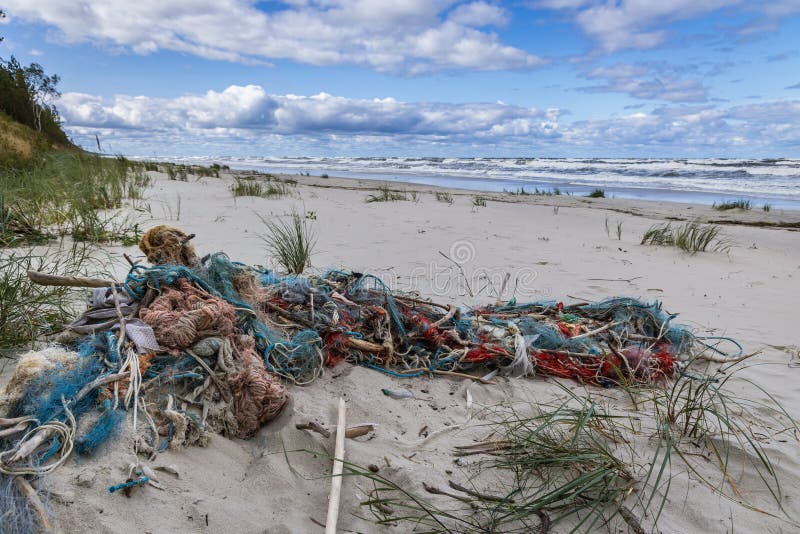 Old fishing nets on Vistula Spit beach, Baltic Sea in Poland