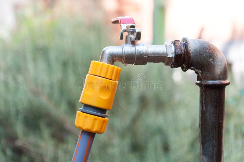 Old Fountain Water with a Hose for Watering Stock Photo Image of