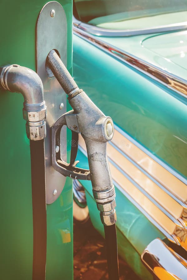 Old Fuel Pump in Front of a Classic Car Stock Image Image of road