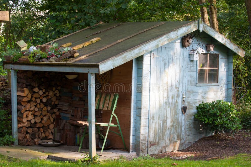 Old garden shed stock photo. Image of chair, leaves 