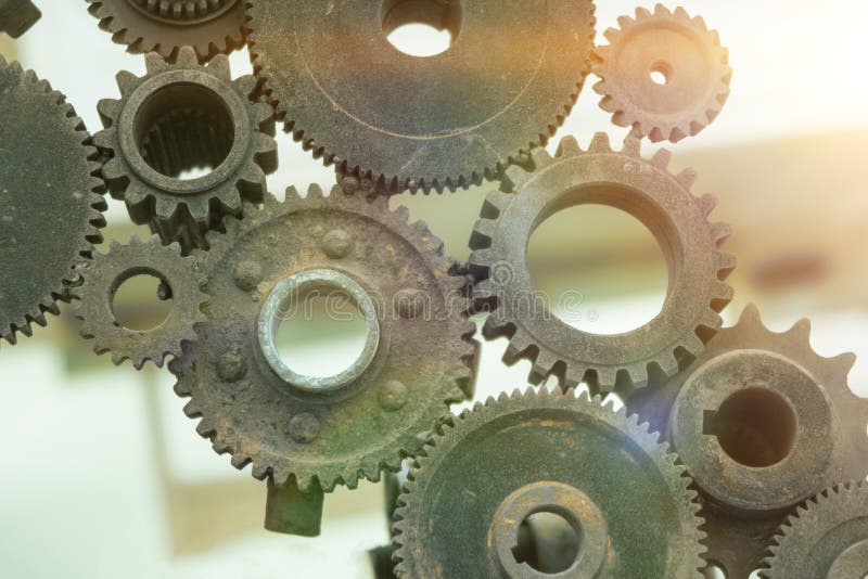 The old gear wheels are assembled into a movement mechanism, the details of the puzzle. royalty free stock photo The old gear wheels are assembled into a movement mechanism, the details of the puzzle. royalty free stock photo