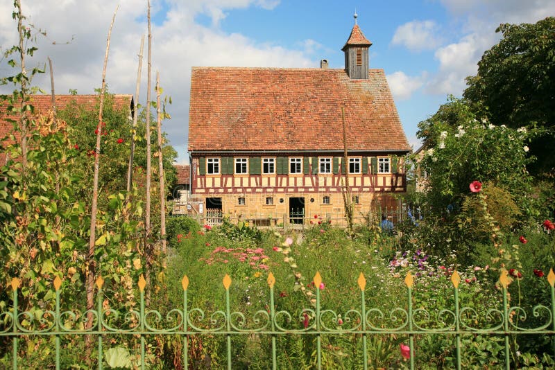 Old German Cottage With Cottage Garden Stock Image Image of blue