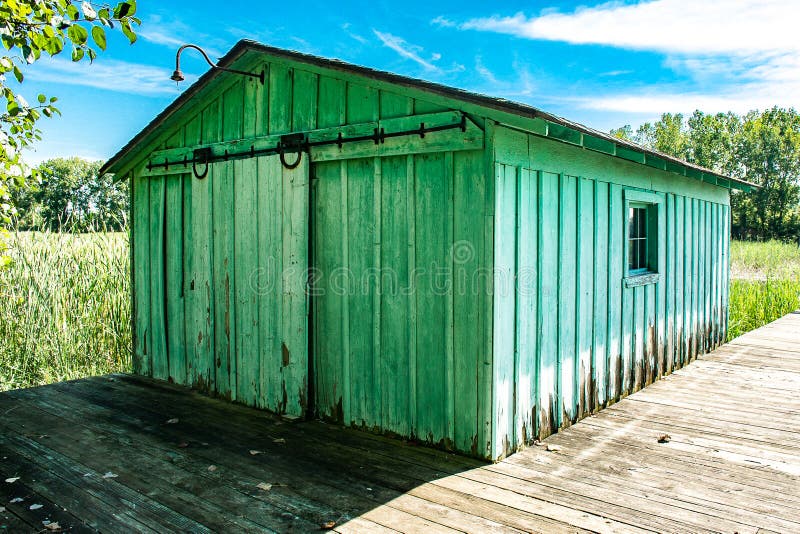 Old green dock house