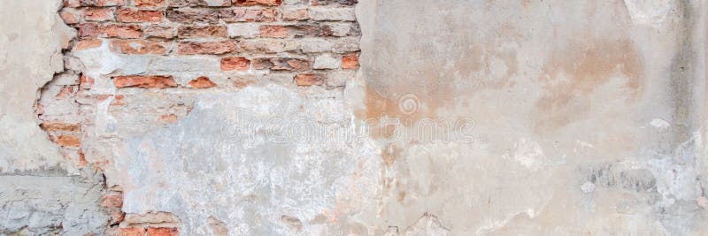 Old grungy red brick wall with peeled white beige stucco banner background. Vintage retro plaster wall with dirty