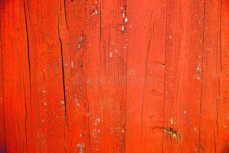 Old grungy and weathered red and orange painted wooden wall plank texture background