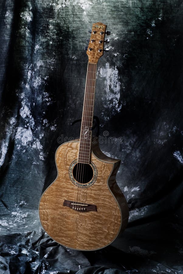 Old guitar in studio editorial image. Image of strings 87605235