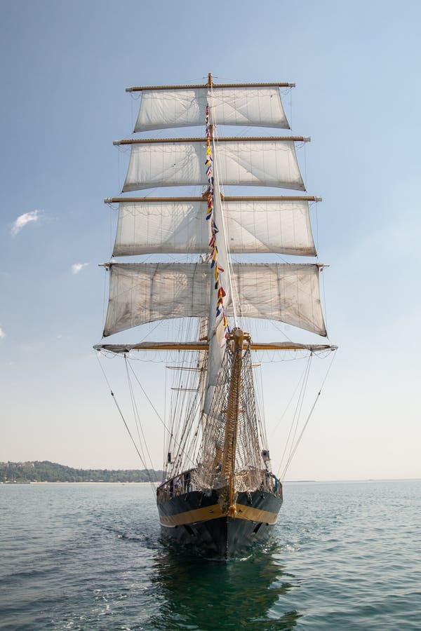 Old Historical Ship Yacht with White Sails, Sailing in the Sea Stock