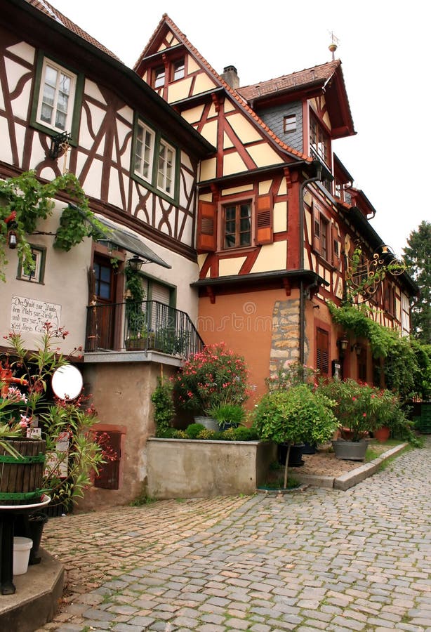 Old house facade with flowers