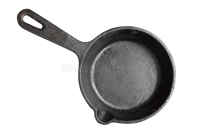 Old iron frying pan isolated